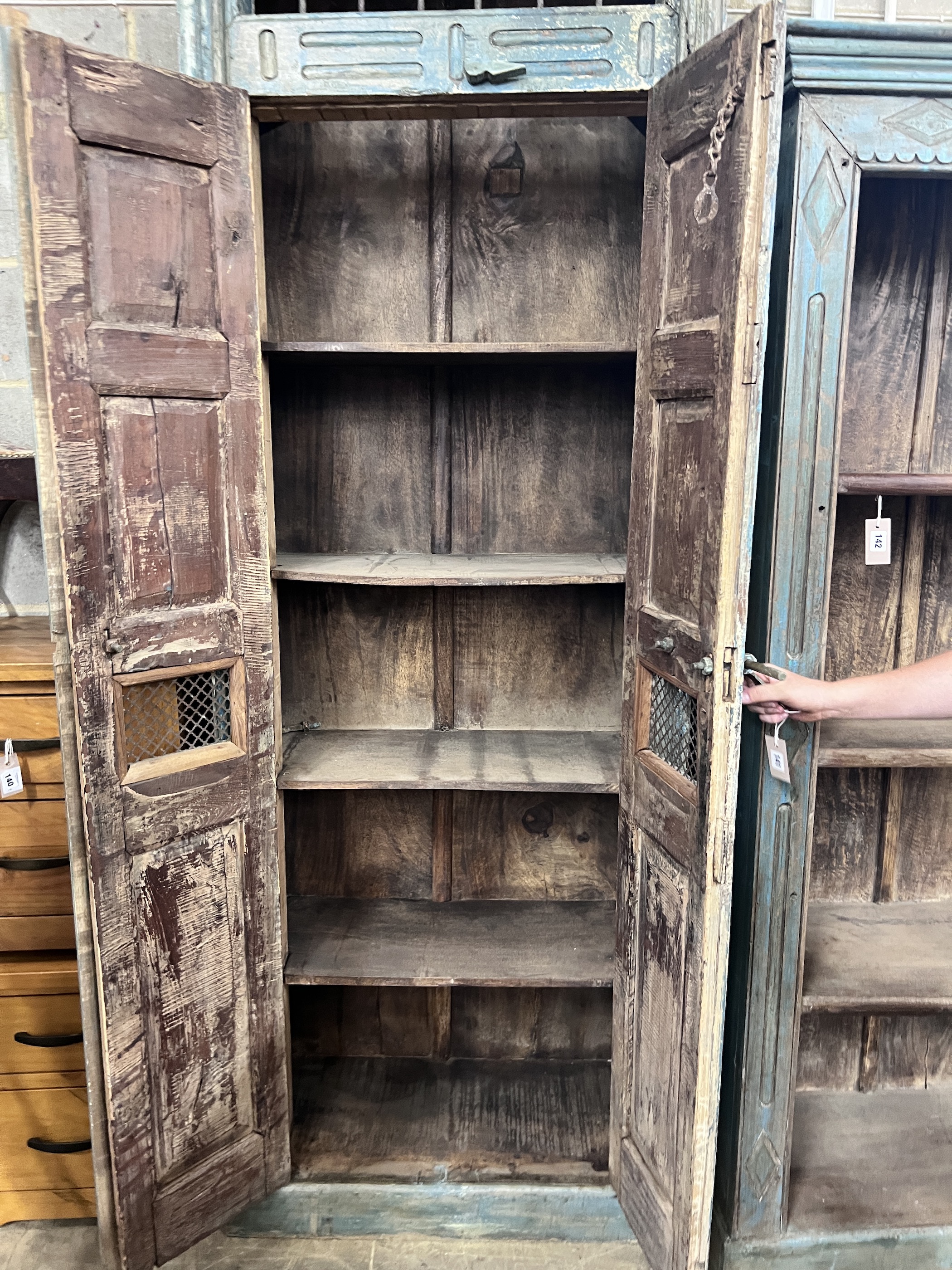 An Indonesian painted hardwood tall cabinet, width 81cm, depth 39cm, height 247cm